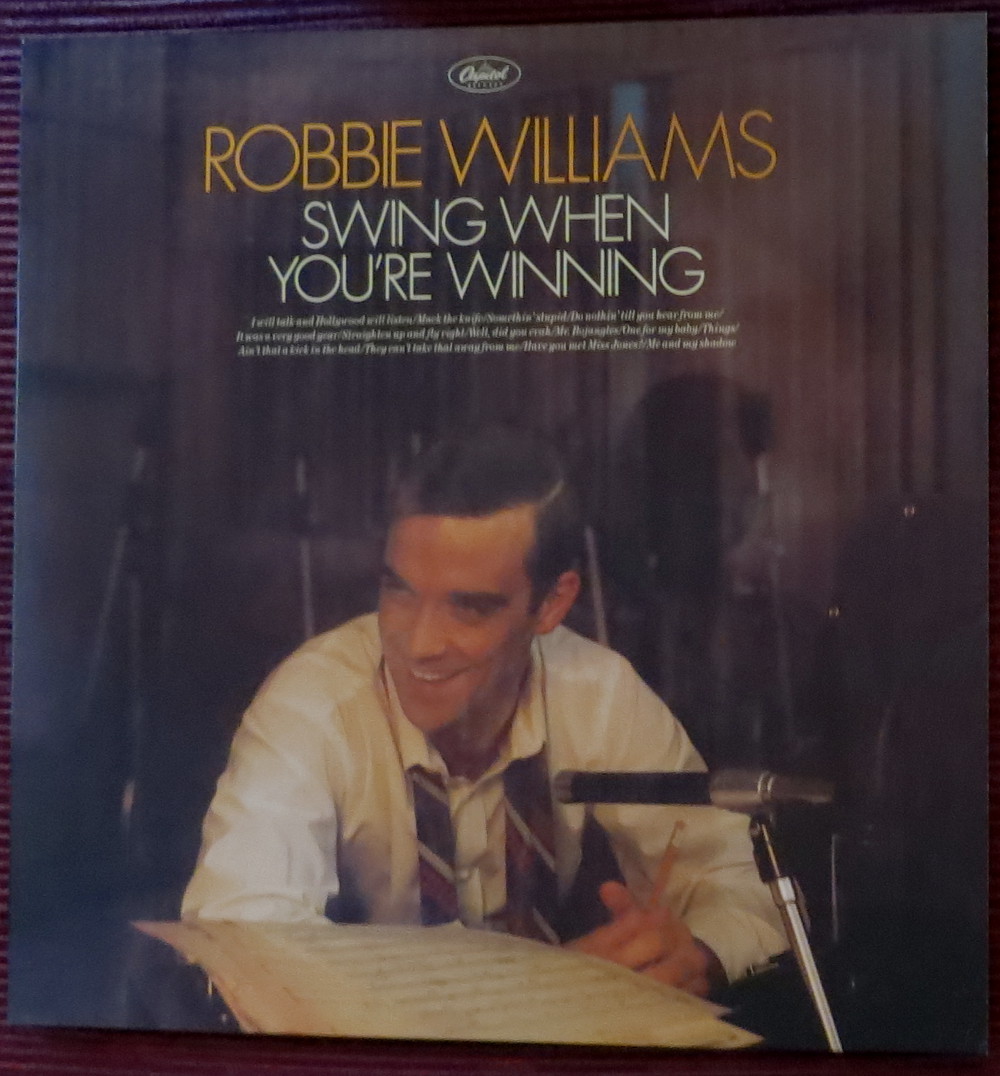 Robbie Williams: "swing when you're winning"